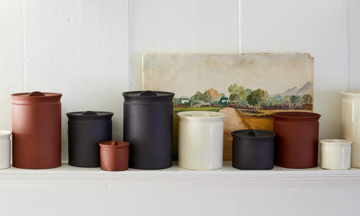 Terracotta clay canisters on a kitchen counter; image curtesy of WGSN