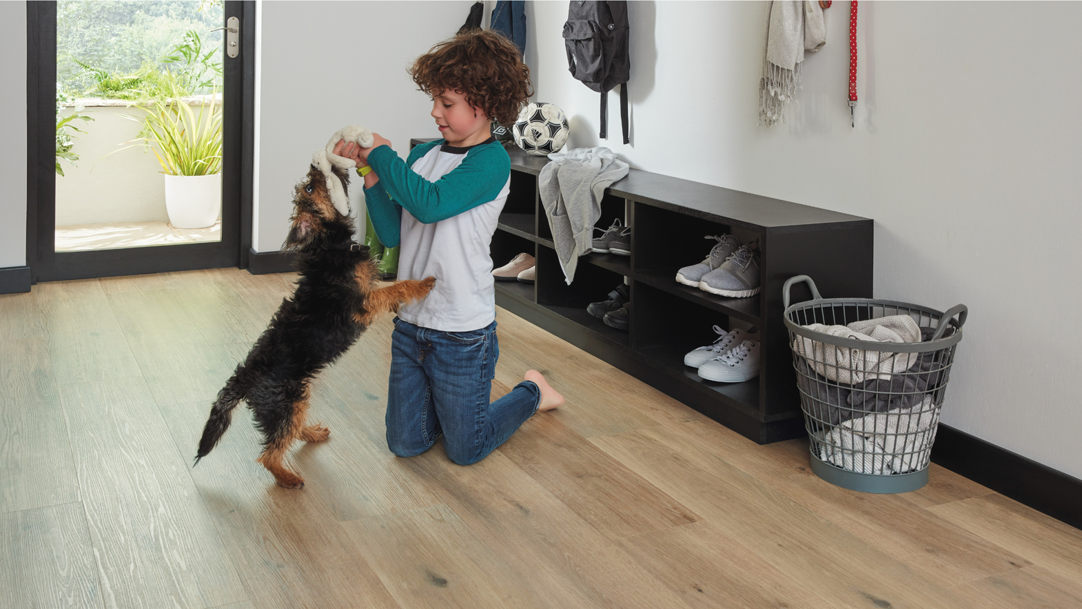 Kid and dog playing on Canadian Urban Oak RKP8116 floors