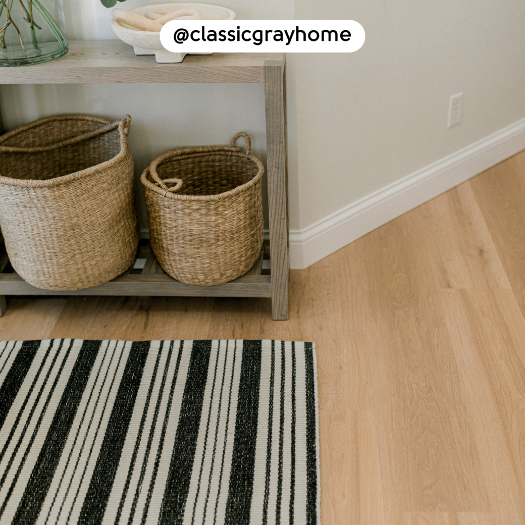 Overhead of a console table and Warm Ash RKP8103 floors; photo credit: @classicgrayhome